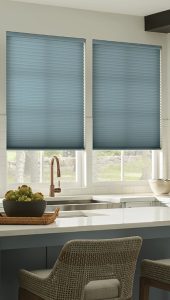 Dark honeycomb shades in the kitchen