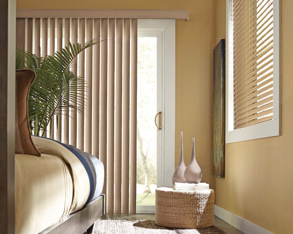 Sliding door shades in a sunny room